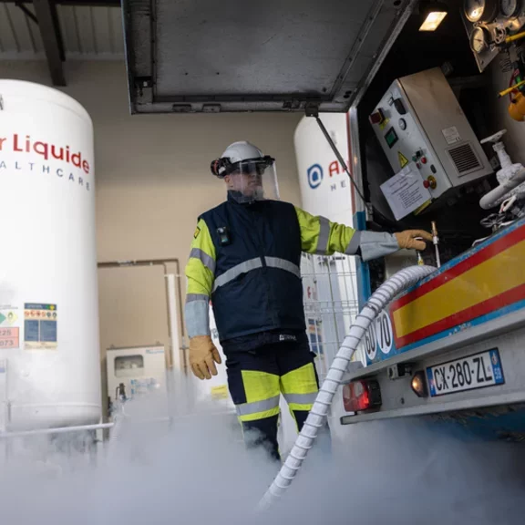 Technician filling a tank 08